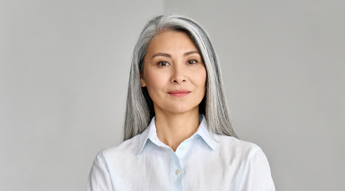 woman in her 40s natural skin illustrating perimenopause related skin changes